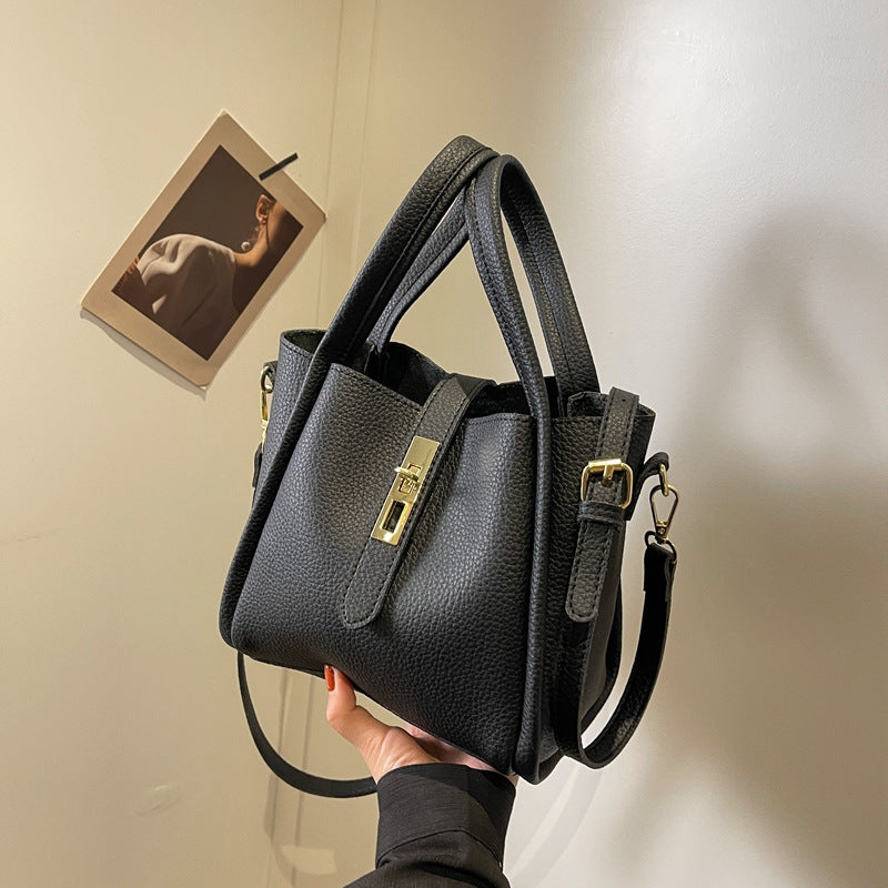 Black Elegant Leather Shoulder Bag - Compact Handbag with Adjustable Strap